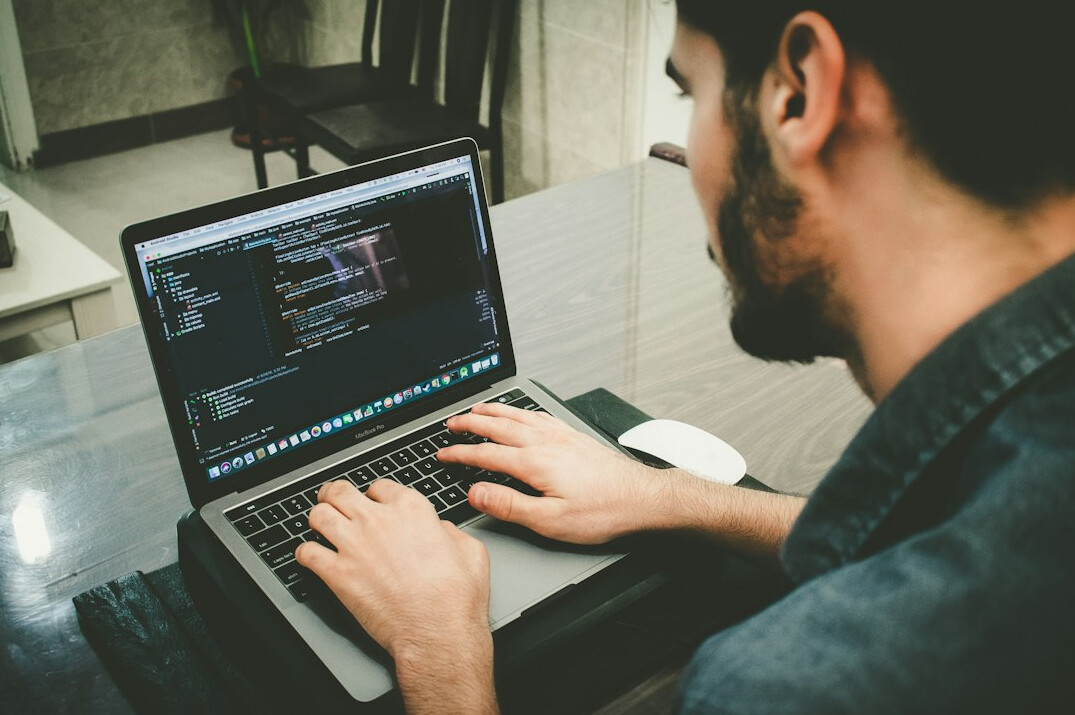 it professional working on laptop