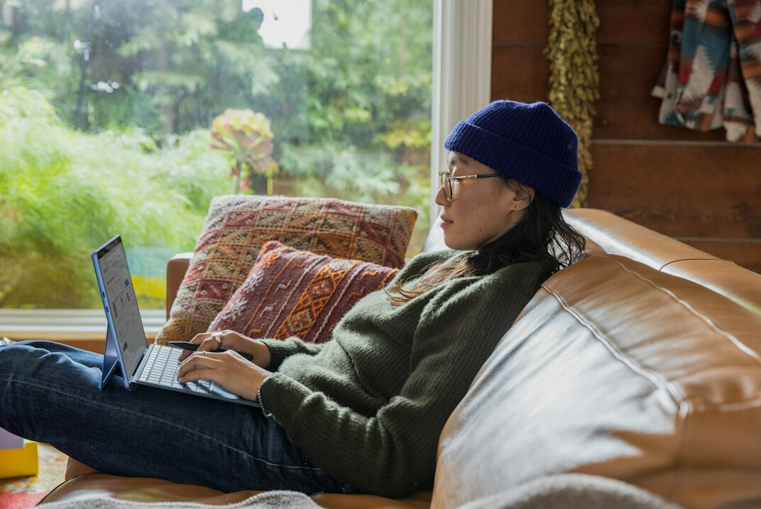 woman coding at home
