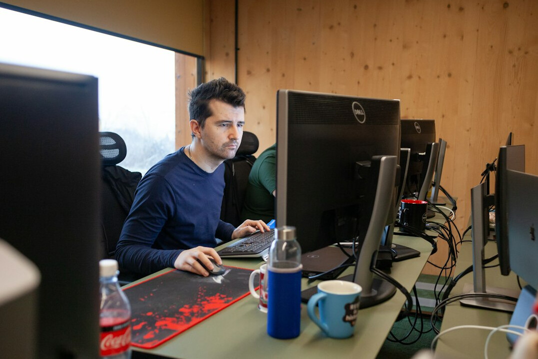 young programmer at desk