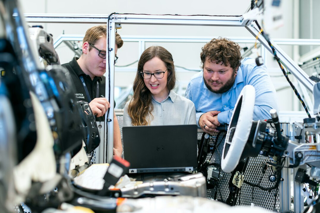 diverse group in coding workshop